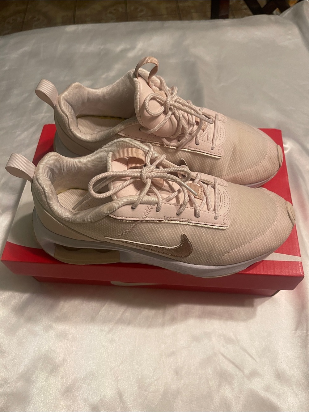 Nike Blush Pink Athletic Sneakers with Gold Swoosh
